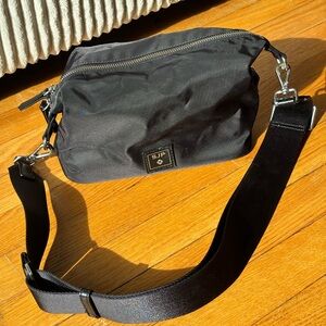 SJP x Samsonite Carried Away Black Crossbody Bag